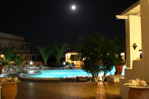 Pool glowing under a full moon